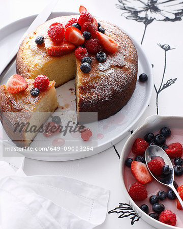 Platter of rose cake with berry topping