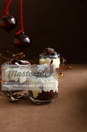 Mousse cups with cream and chocolate
