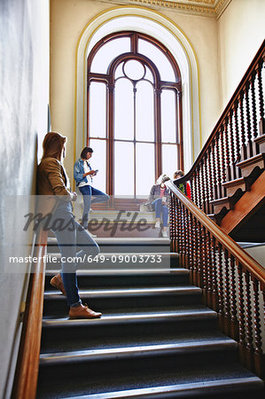 Students hanging out on stairs