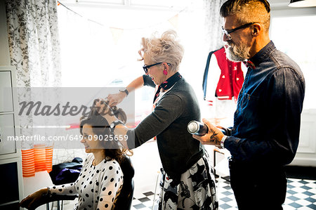 Couple working in hair salon