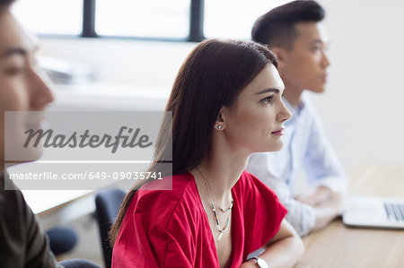 Students sitting side by side in class