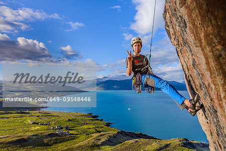 Traditional climbing on sandstone rock, Narsaq, Kitaa, Greenland