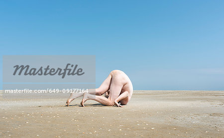 Nude man on sandbank Nude man on sandbank