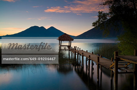 Wooden pier in still lake