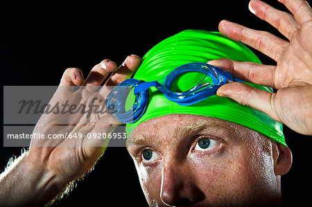 Close up of swimmer with goggles and swimming cap