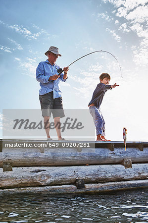 Grandfather and grandson fishing, Utvalnas, Sweden - Stock Photo -  Masterfile - Premium Royalty-Free, Code: 649-09207281