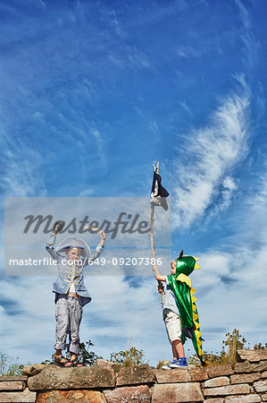 Two boys dressed up, one holding pirate flag, Eggergrund, Sweden