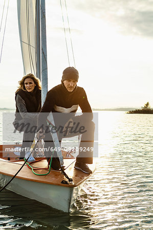 Mature couple on sailing boat
