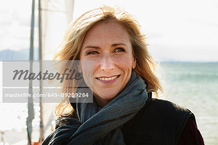 Portrait of mature woman, outdoors, smiling