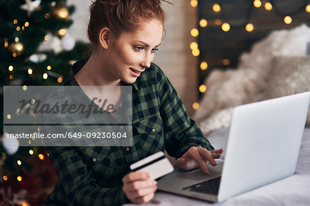 Woman shopping for Christmas presents online