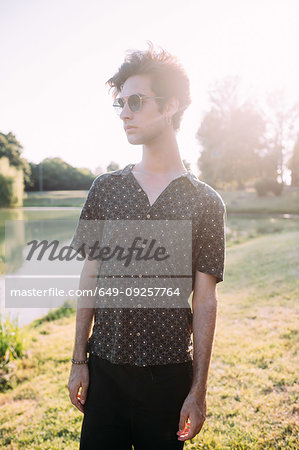 Young man by lake