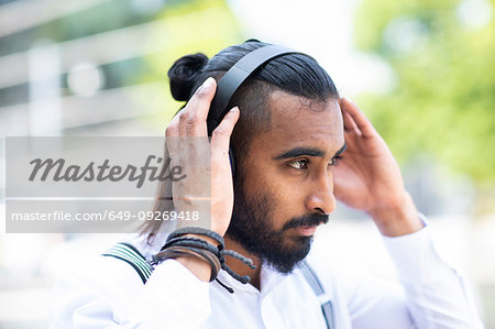 Man with headphones outdoors