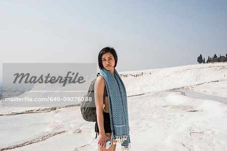 Woman enjoying cotton castle, Pamukkale, Denizli, Turkey