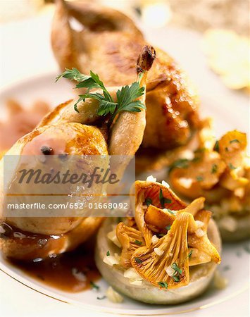 Quail and artichoke bases with chanterelle mushrooms