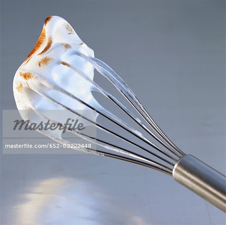Grilled meringue on a whisk