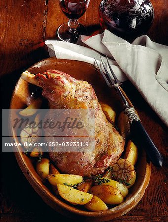 Shoulder of lamb with garlic and patatoes