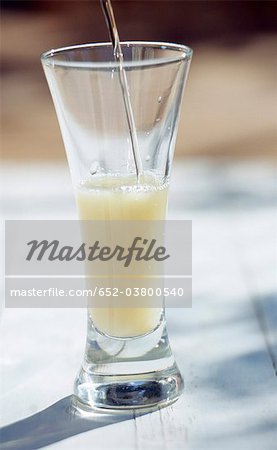 Preparing a glass of Pastis