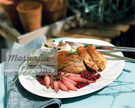 Stuffed leg of guinea-fowl with radishes and redcurrants