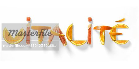 Vitalité written with citrus fruit