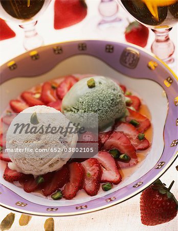 Strawberries with Izarra and pistachios,pistachio and almond ice cream