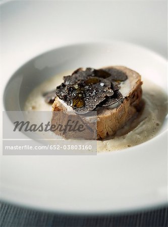 Veal fillet with black truffles and cream of Jerusalem artichokes