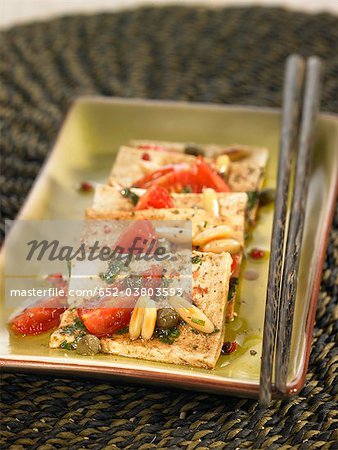 Tofu with basil,tomatoes,capers and pine nuts