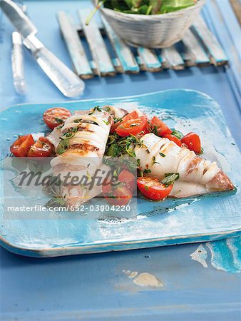 Grilled squid with tomatoes and herbs