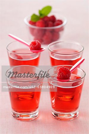 Glasses of raspberry cordial