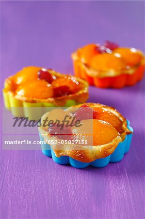 Apricot and candied cherry tartlets