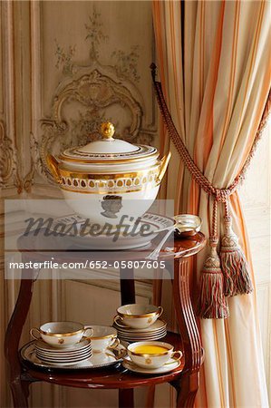 Soup tureen with pumpkin soup in a luxurious decor Soup tureen with pumpkin soup in a luxurious decor