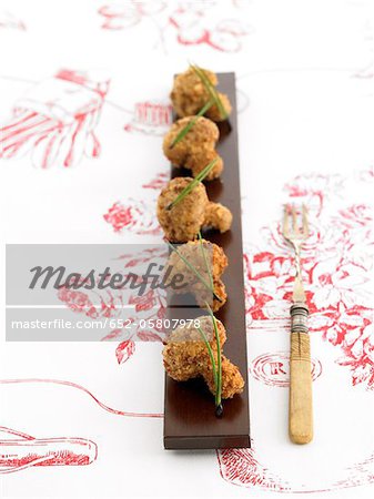 Deep-fried boletus mushrooms coated in breadcrumbs