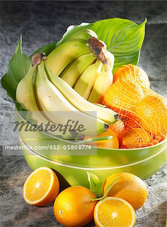 Bowl of bananas and oranges