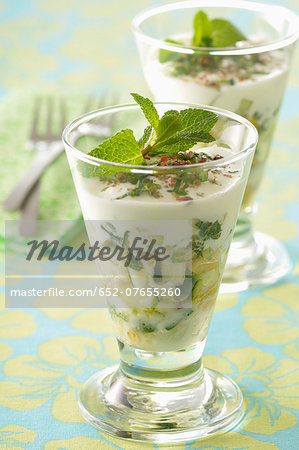 Diced cucumber and pear in cream with pine nuts Diced cucumber and pear in cream with pine nuts