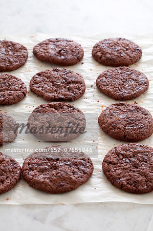 Chocolate cookies on wax paper