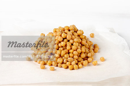 Cooked chickpeas on a white background