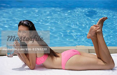 Beautiful Big Breasted Bikini Woman by a Pool Stock Image - Image of pink,  beautiful: 28493719