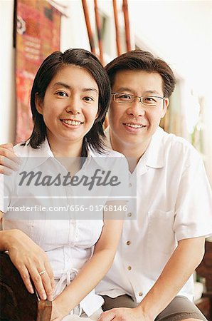 Couple looking at camera, portrait