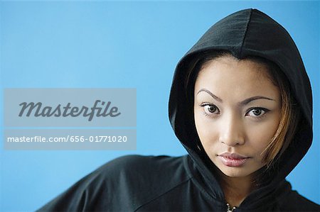 Woman wearing hooded shirt