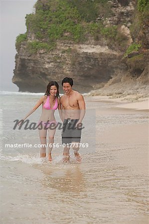 Couple walking on beach