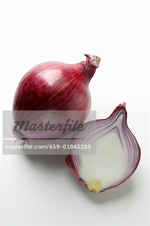 Whole and half red onion