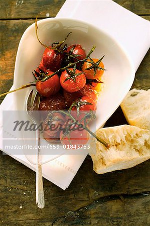 Marinated fried cherry tomatoes, white bread