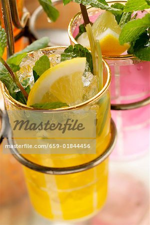Lemonade with ice cubes and fresh mint