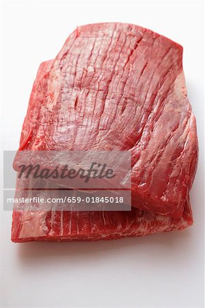 Raw flank steaks