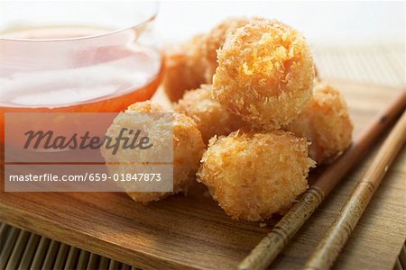 Breaded shrimp balls with sweet and sour sauce (Asia)