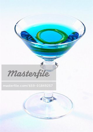 Blue Curacao cocktail with lemon rind
