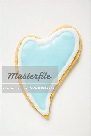 Heart-shaped biscuit with pale blue icing