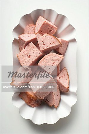 Diced Leberk0se (a type of meatloaf) in paper dish