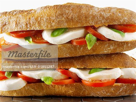 Two mozzarella and tomato baguettes