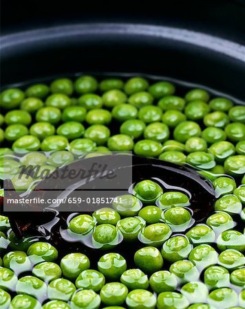 Peas in a bowl of water
