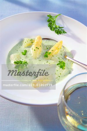 Creamed asparagus soup with white asparagus tips